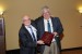 Professor T. Grandon Gill receives a plaque of appreciation of the Plenary Keynote Address he delivered, from Dr. Nagib Callaos, conference General Chair.